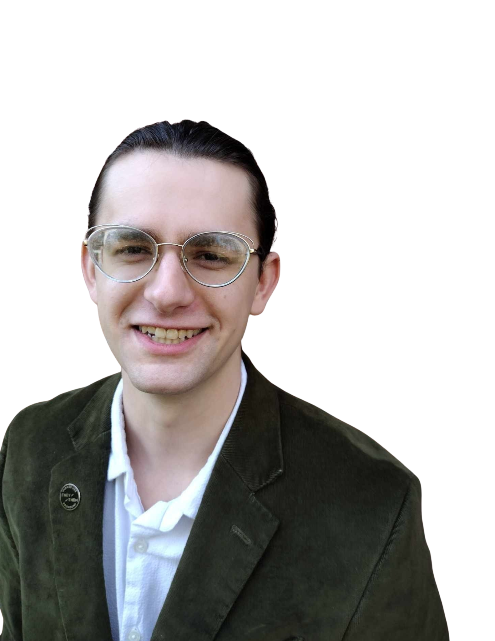 Zachery Fuller smiling at the camera whilewearing a green suit.